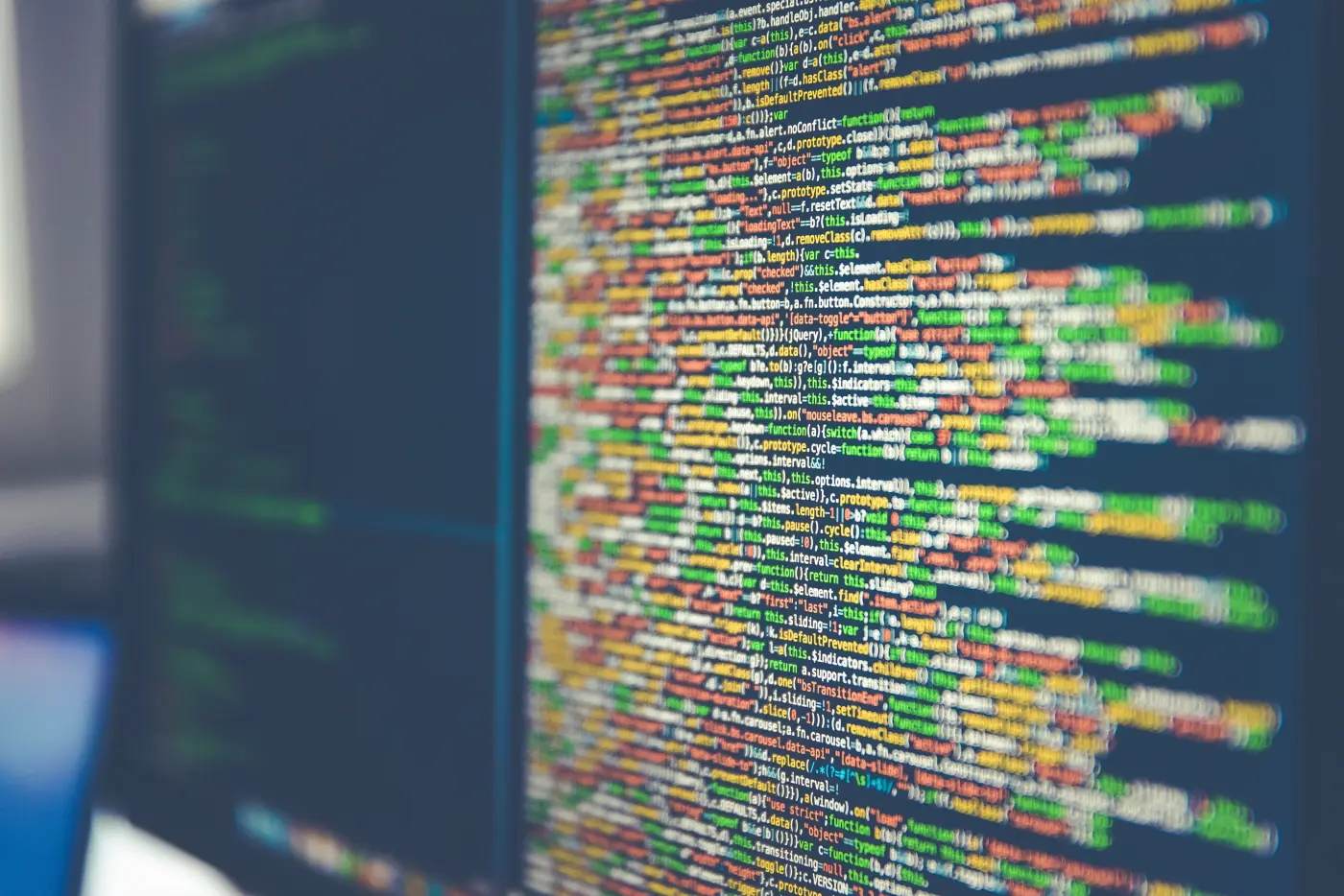 Colourful source code on a computer monitor